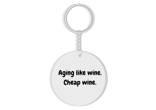 Aging like wine.Cheap wine keyring - funny birthday gift - cheeky relatable gift