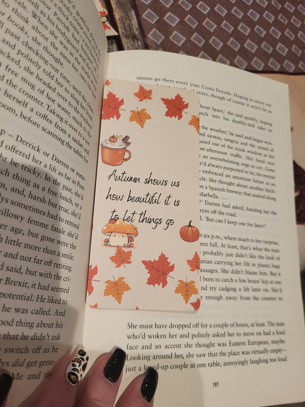 Autumn Bookmark in Book: "Autumn shows us how beautiful it is to let things go."