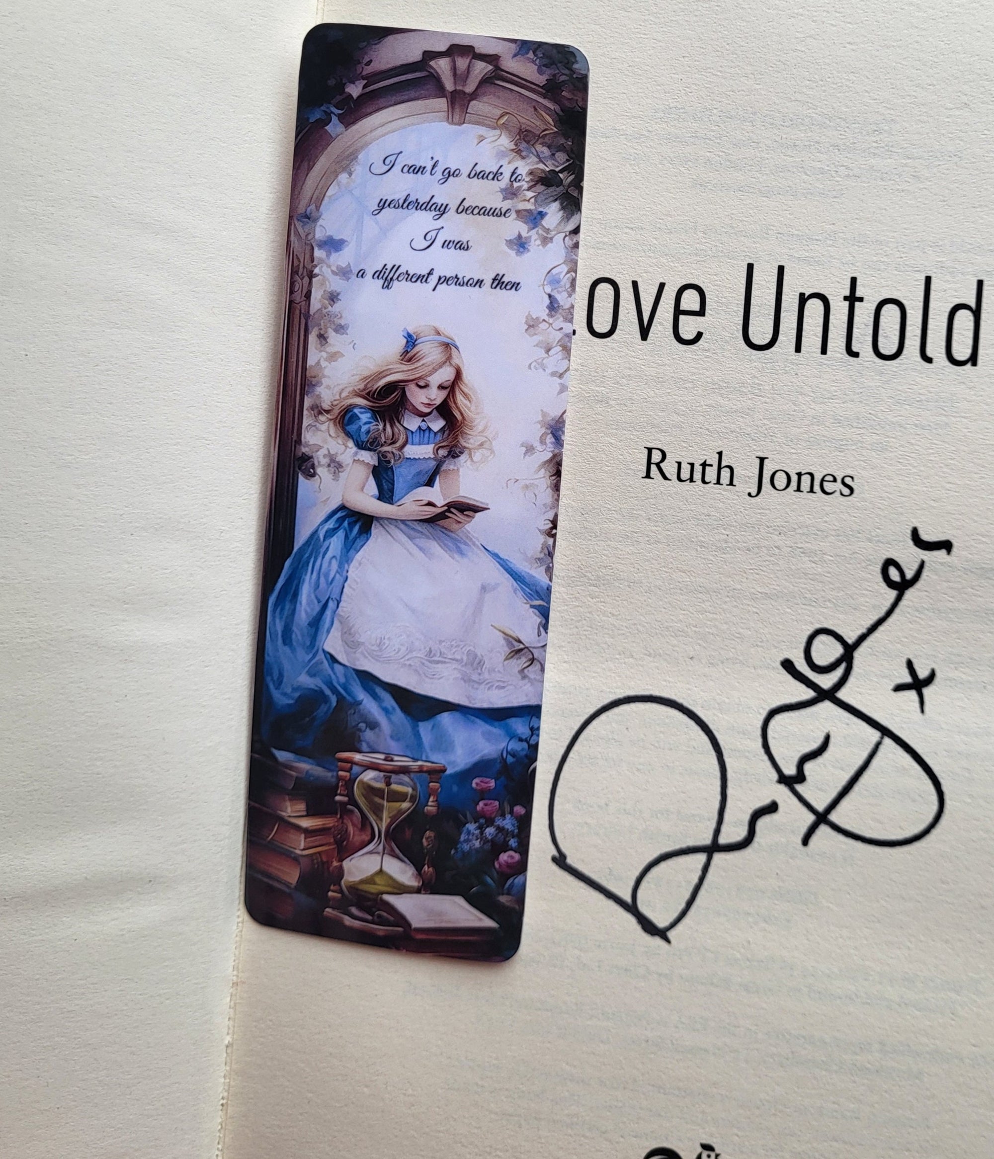 Alice in Wonderland Bookmark: "I can't go back to yesterday..." with "Love Untold" book by Ruth Jones