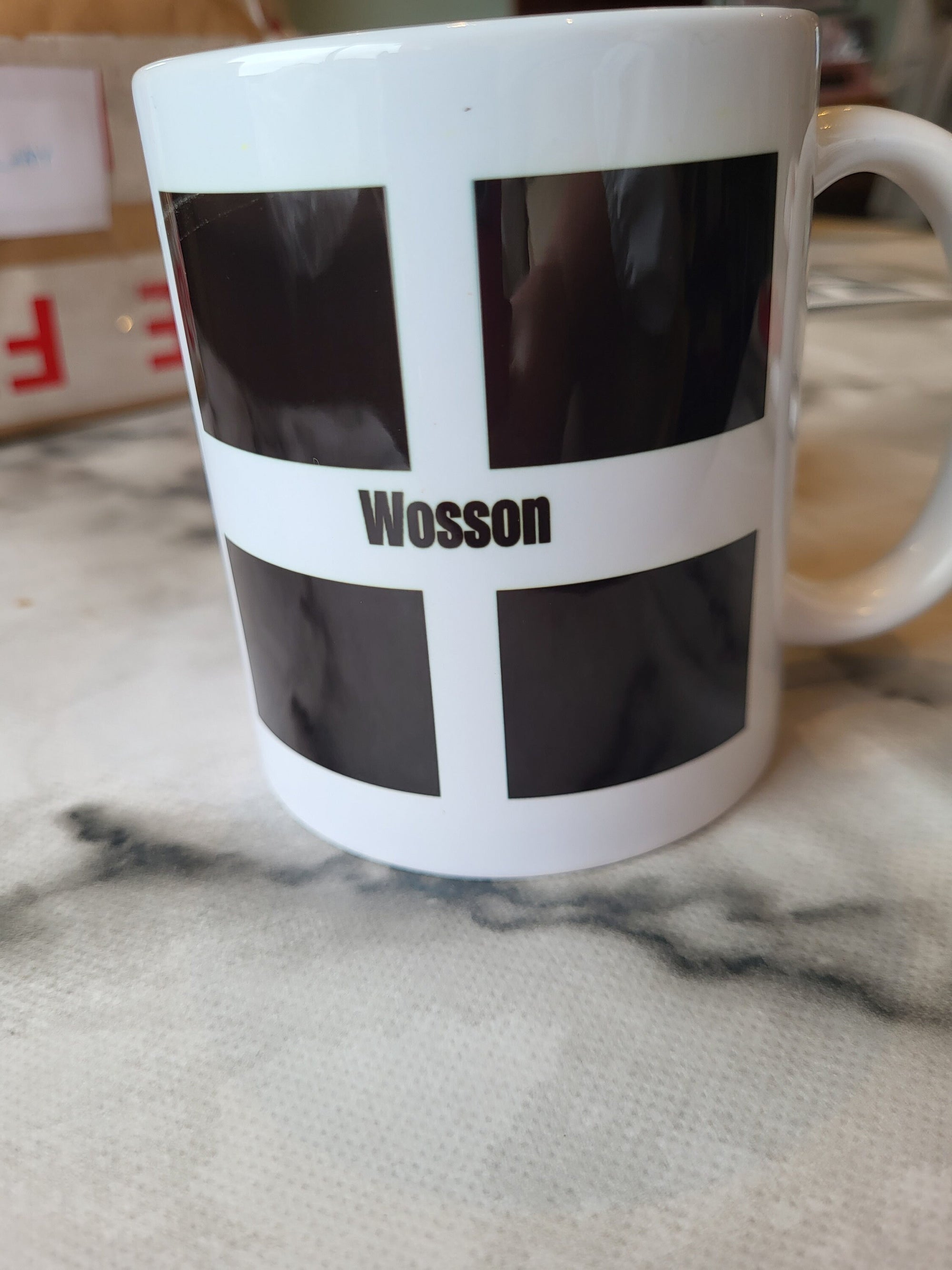 White Wosson mug with black and white cross design. Coffee or tea cup.