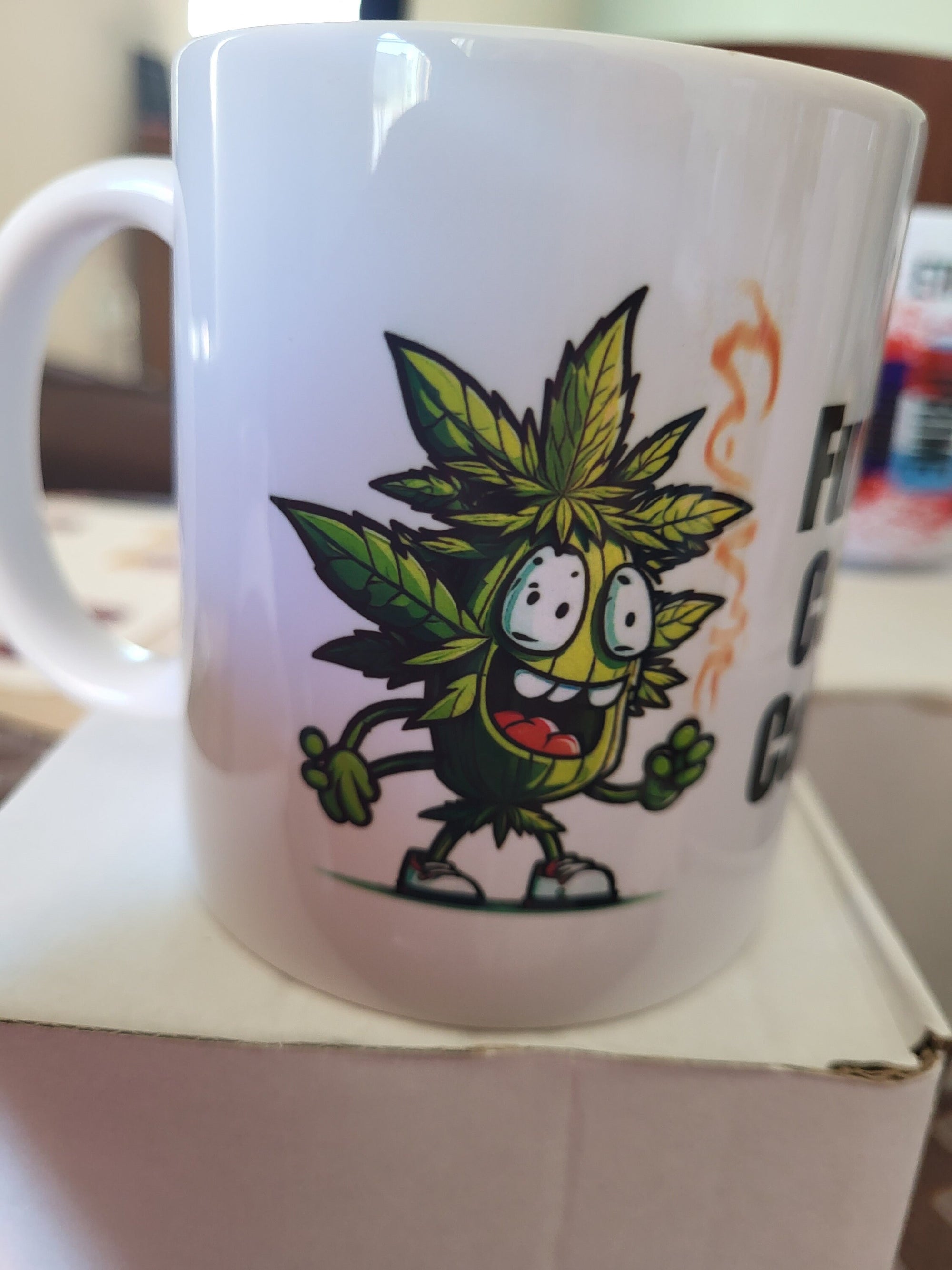 Weed Cartoon Mug: Funny Cannabis Leaf Character on Coffee Cup with Smoke. Pot Culture Gift Idea.