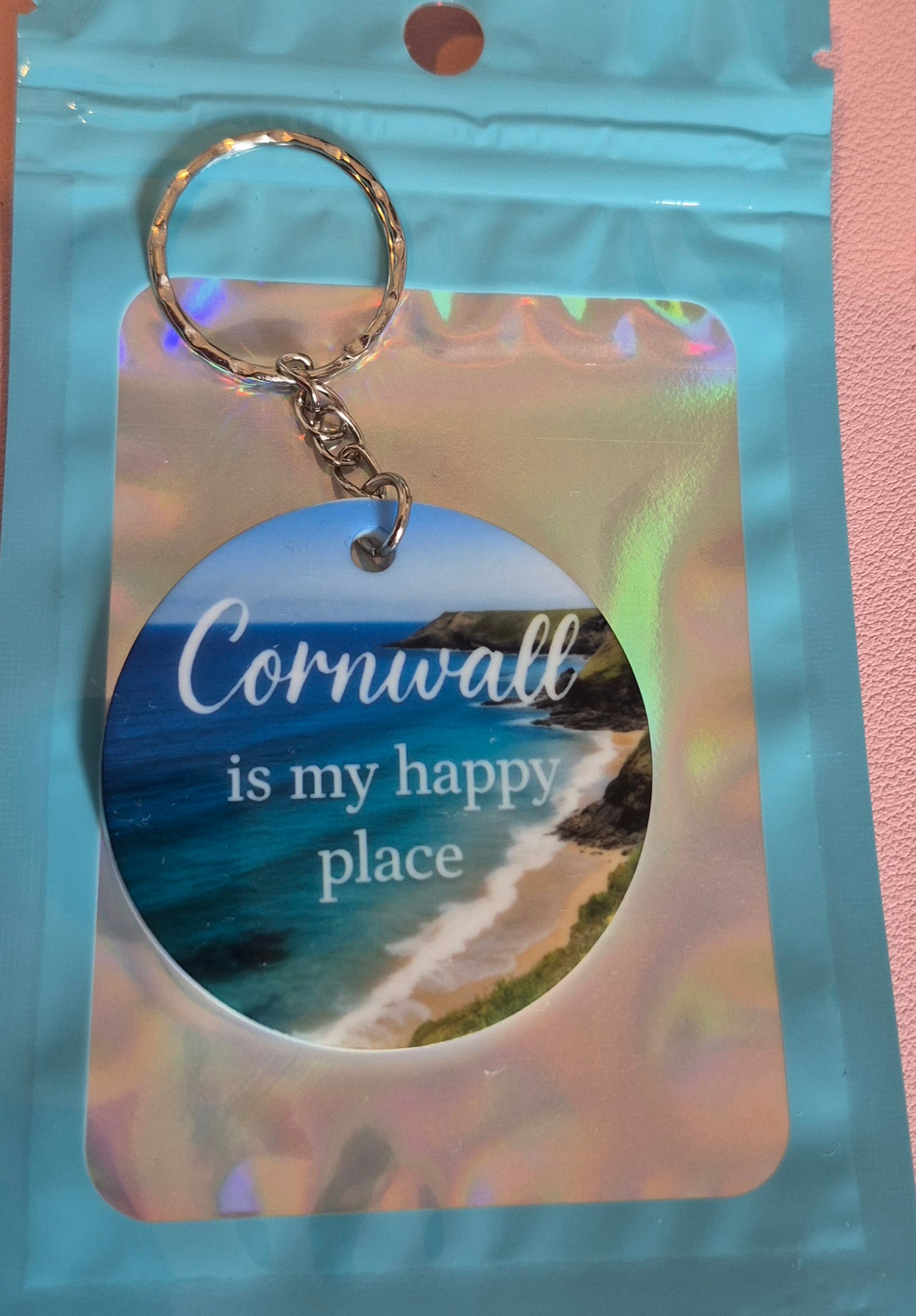 Cornwall Is My Happy Place Keyring – Coastal Gift – Round Acrylic Keyring with Beach Photo – Handmade Cornish Souvenir in Holographic Pouch