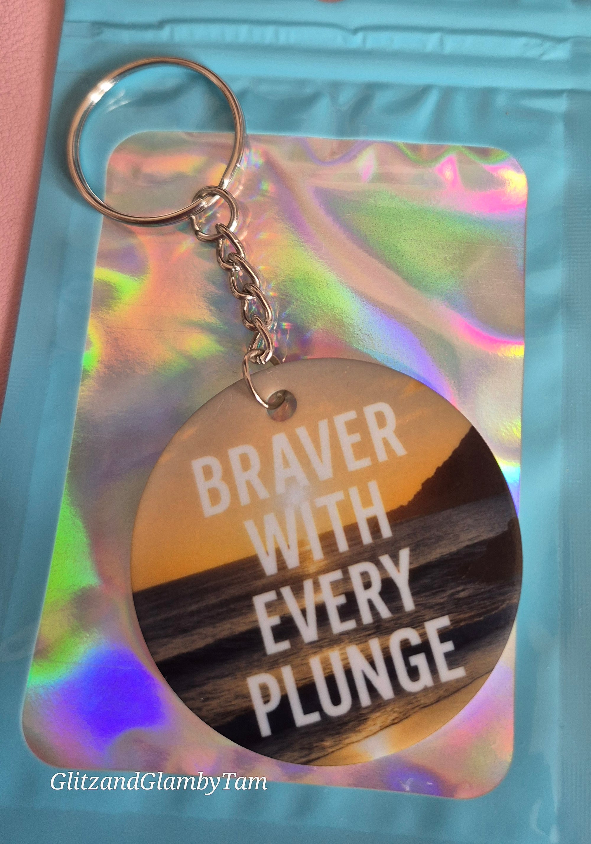 Braver With Every Plunge Keyring – Cold Water Swimming Gift – Sea Dip Motivation – Round Acrylic Keyring – Sunset Ocean Vibes – Holographic Gift Pouch