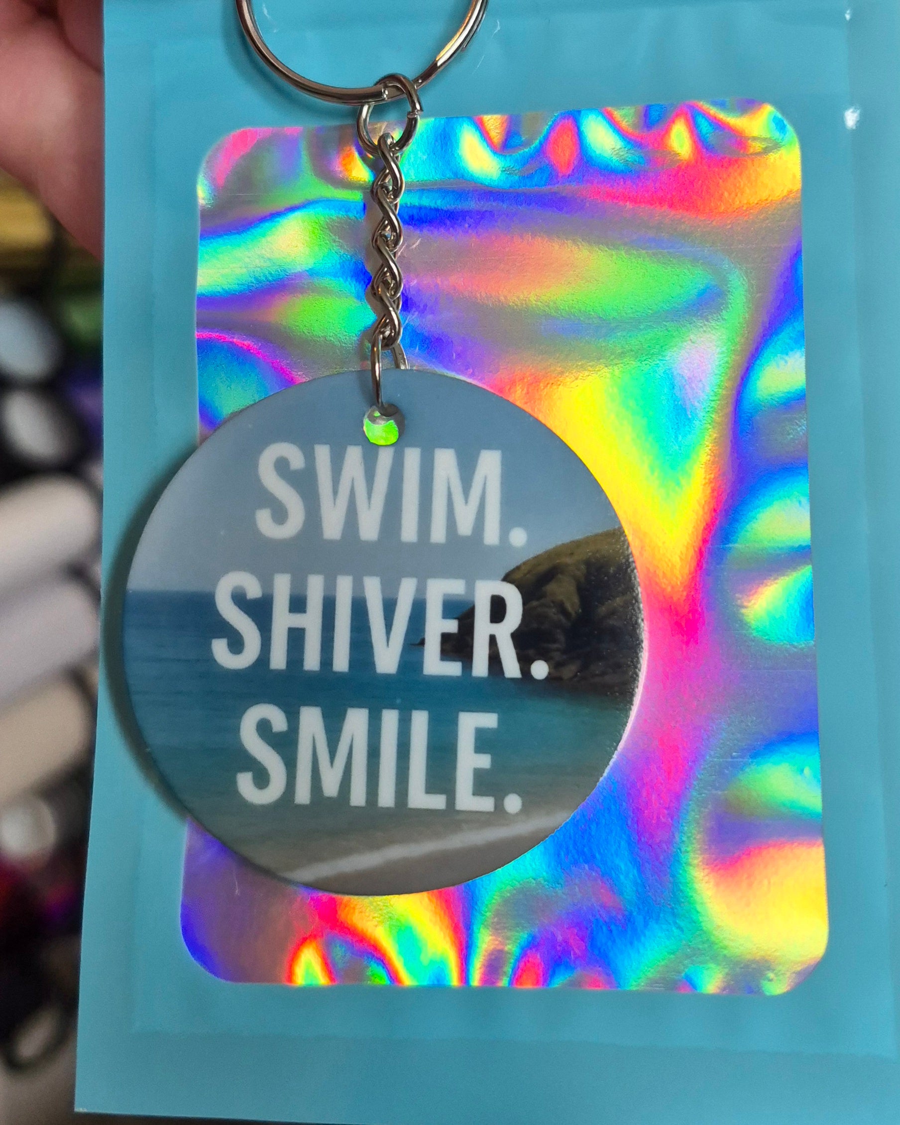 Swim Shiver Smile Keyring – Wild Swimming Gift – Sea Swimmer Acrylic Keychain – Cold Water Dip Accessory – Beach Lover Gift in Holographic Pouch